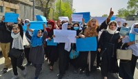Afghan Women Protest Taliban's Burqa Dik...